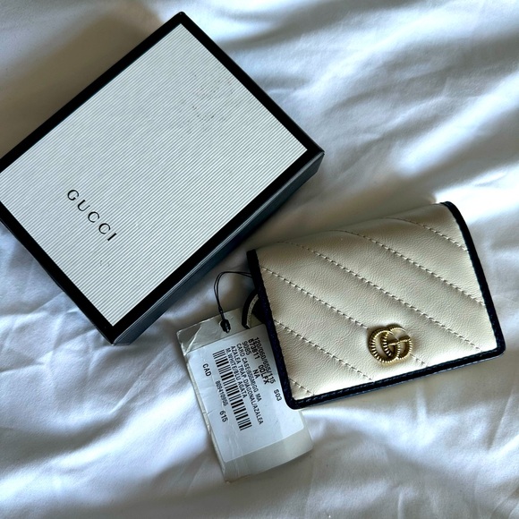 Gucci Handbags - Gucci cream wallet BNIB